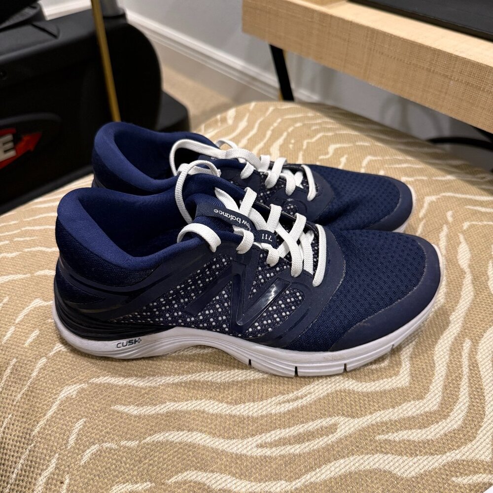 New Balance 711 in Navy and White